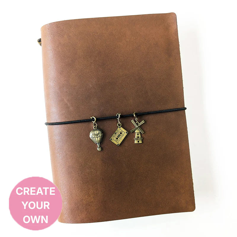 JOURNAL WITH CHARMS
